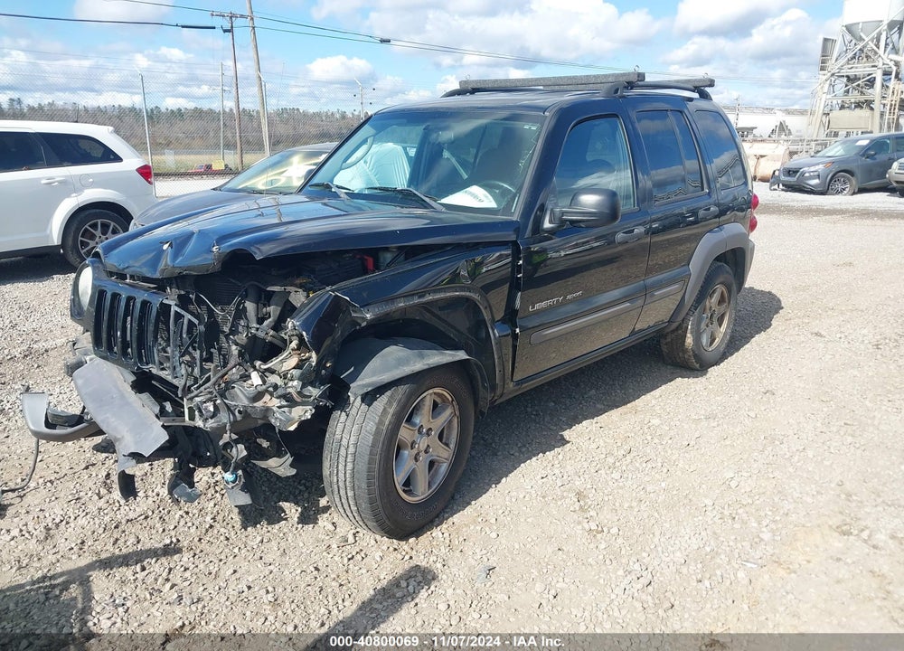 2003 JEEP LIBERTY SPORT VIN: 1J4GL48K53W718092