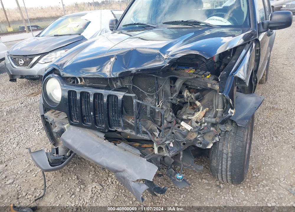 2003 JEEP LIBERTY SPORT VIN: 1J4GL48K53W718092