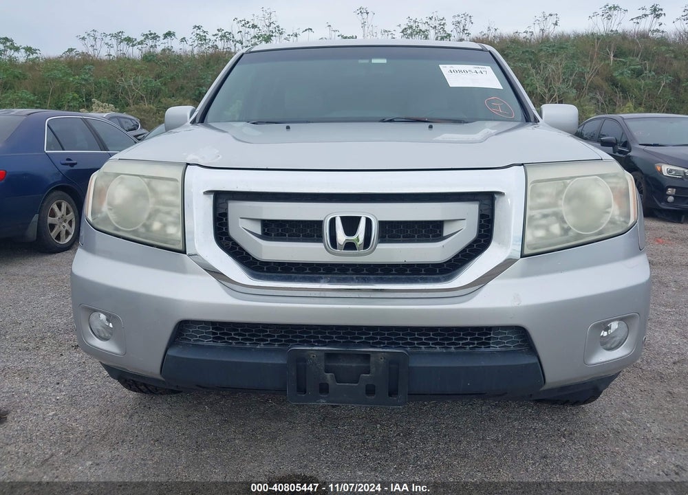 2011 HONDA PILOT TOURING VIN: 5FNYF4H97BB013585