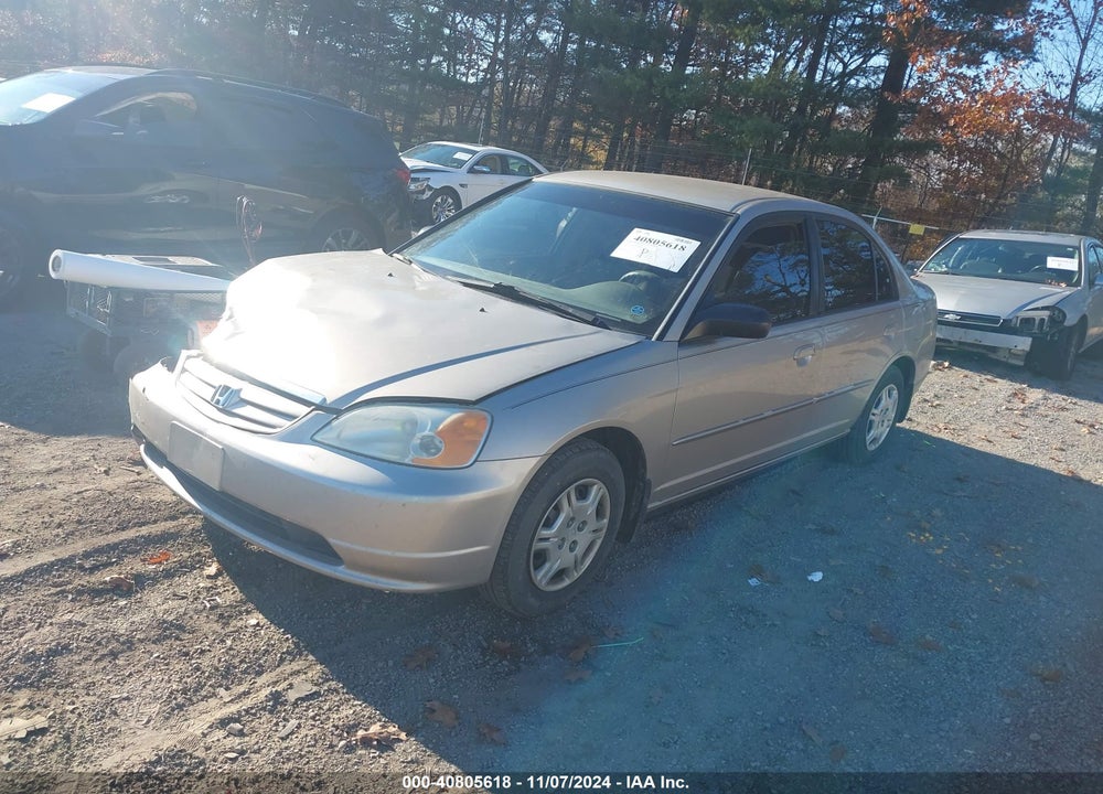 2002 HONDA CIVIC LX VIN: 1HGES165X2L040680