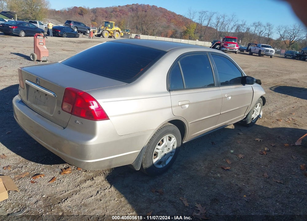 2002 HONDA CIVIC LX VIN: 1HGES165X2L040680