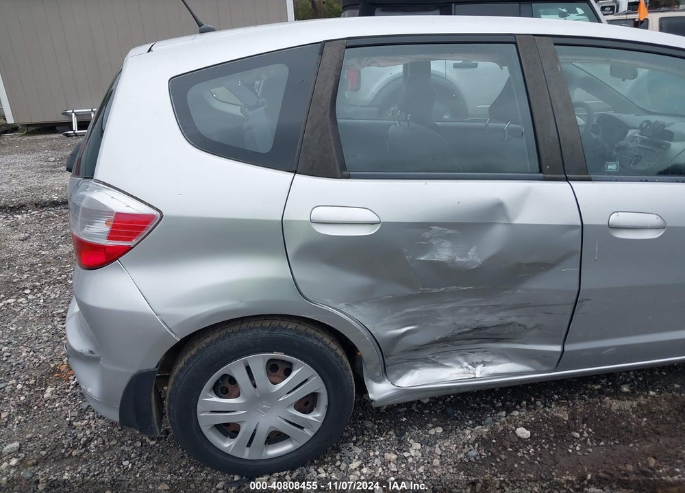 2011 HONDA FIT VIN: JHMGE8H36BS002869