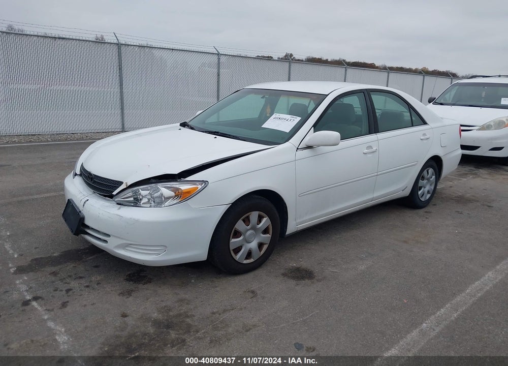 2002 TOYOTA CAMRY LE VIN: JTDBE32K420090508