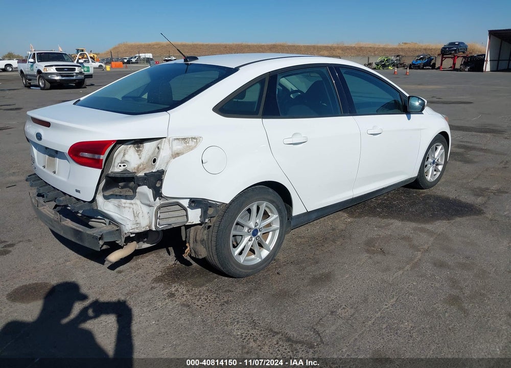 2016 FORD FOCUS SE VIN: 1FADP3F23GL277182