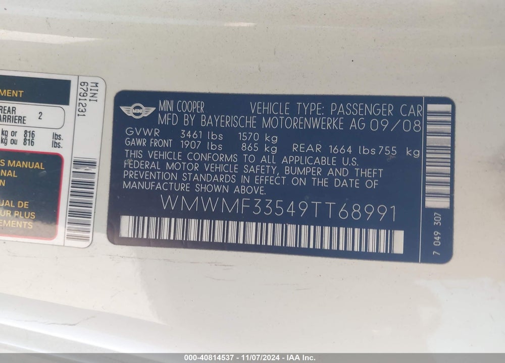 2009 MINI COOPER VIN: WMWMF33549TT68991