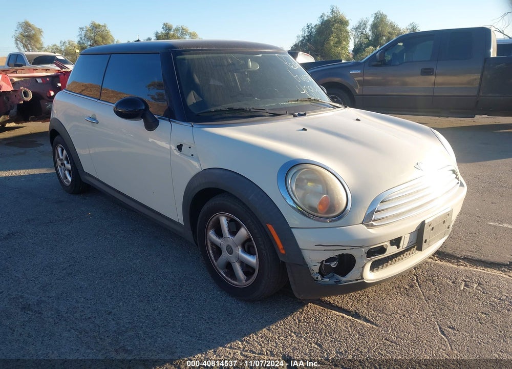 2009 MINI COOPER VIN: WMWMF33549TT68991