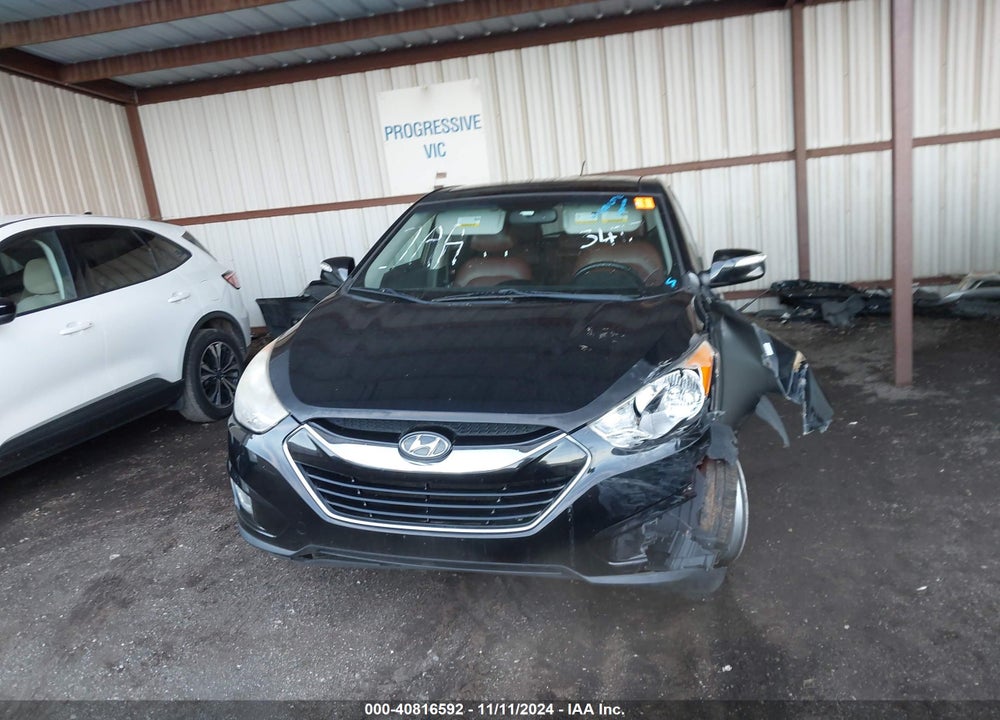 2012 HYUNDAI TUCSON LIMITED VIN: KM8JUCAC5CU343477