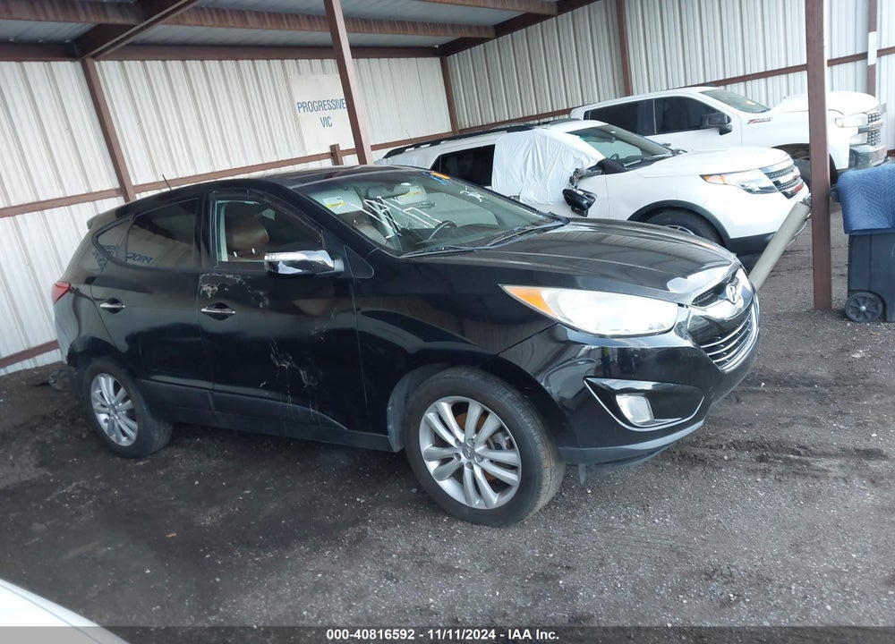 2012 HYUNDAI TUCSON LIMITED VIN: KM8JUCAC5CU343477