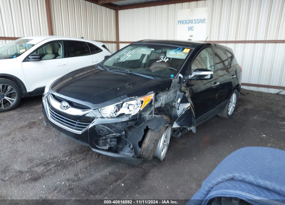 2012 HYUNDAI TUCSON LIMITED VIN: KM8JUCAC5CU343477