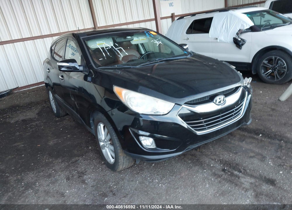 2012 HYUNDAI TUCSON LIMITED VIN: KM8JUCAC5CU343477