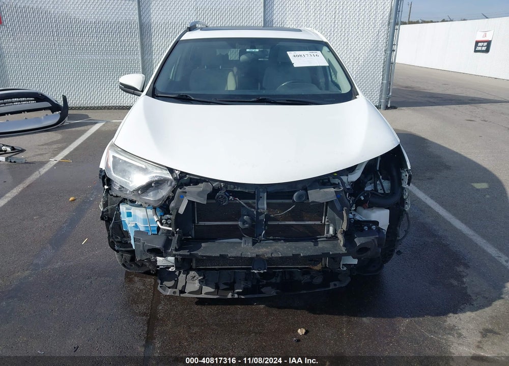 2016 TOYOTA RAV4 HYBRID XLE VIN: JTMRJREV2GD058062
