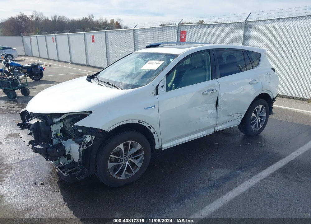 2016 TOYOTA RAV4 HYBRID XLE VIN: JTMRJREV2GD058062
