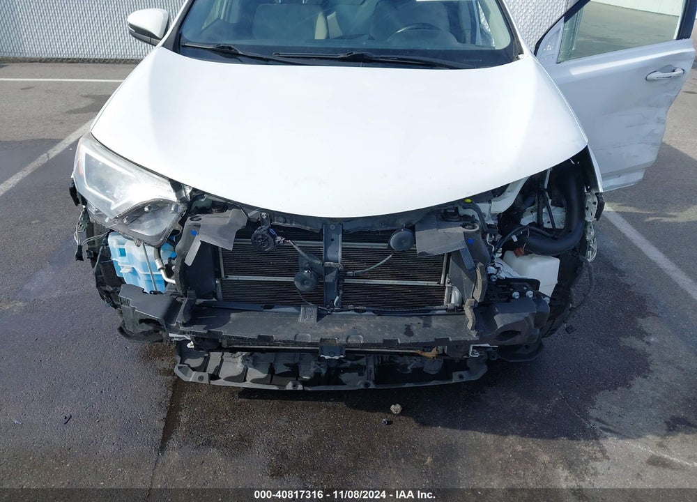 2016 TOYOTA RAV4 HYBRID XLE VIN: JTMRJREV2GD058062