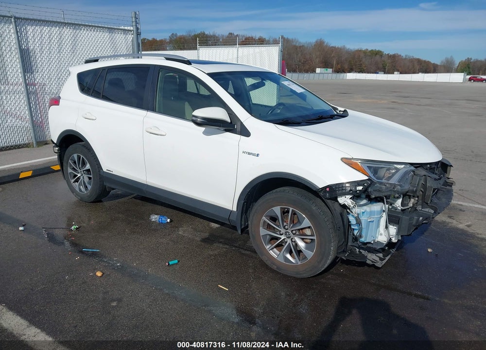 2016 TOYOTA RAV4 HYBRID XLE VIN: JTMRJREV2GD058062
