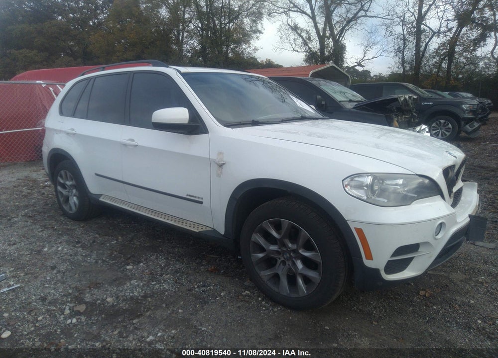2012 BMW X5 XDRIVE35I/XDRIVE35I PREMIUM/XDRIVE35I SPORT ACTIVITY VIN: 5UXZV4C57CL986961