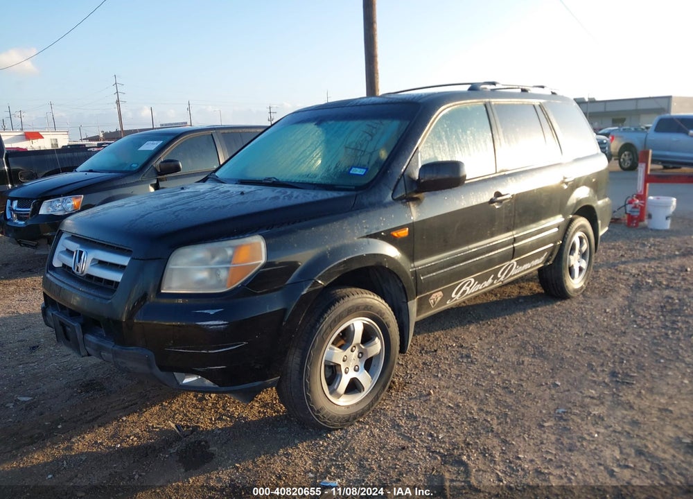 2007 HONDA PILOT EX-L VIN: 2HKYF18577H531426