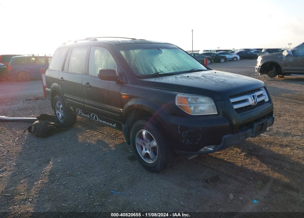 2007 HONDA PILOT EX-L VIN: 2HKYF18577H531426