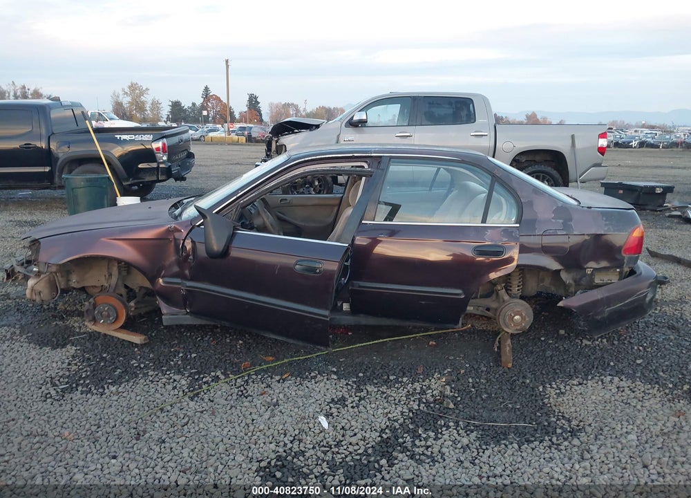 2000 HONDA CIVIC LX VIN: 1HGEJ6572YL024100