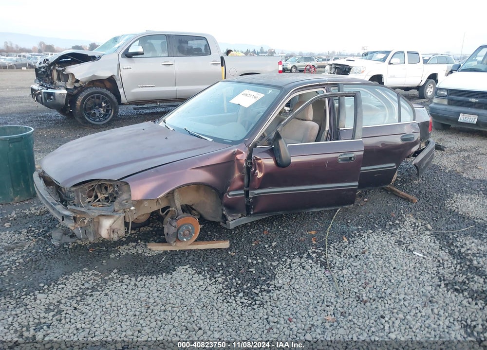 2000 HONDA CIVIC LX VIN: 1HGEJ6572YL024100