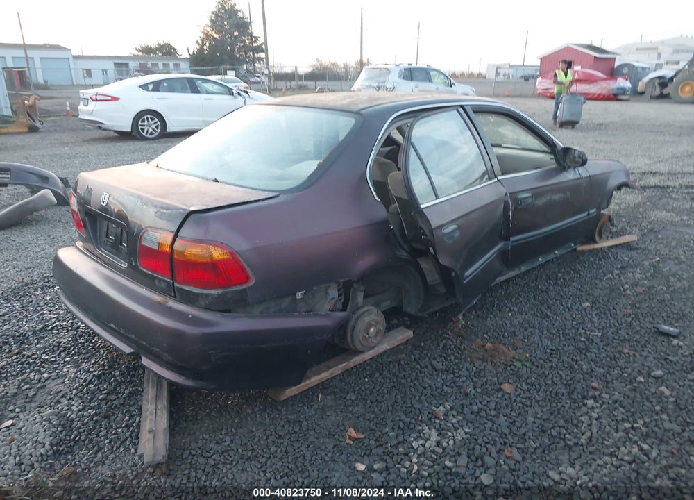 2000 HONDA CIVIC LX VIN: 1HGEJ6572YL024100
