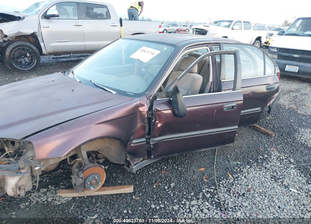 2000 HONDA CIVIC LX VIN: 1HGEJ6572YL024100