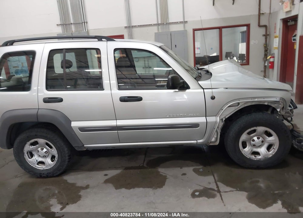 2003 JEEP LIBERTY SPORT VIN: 1J4GL48K73W643329