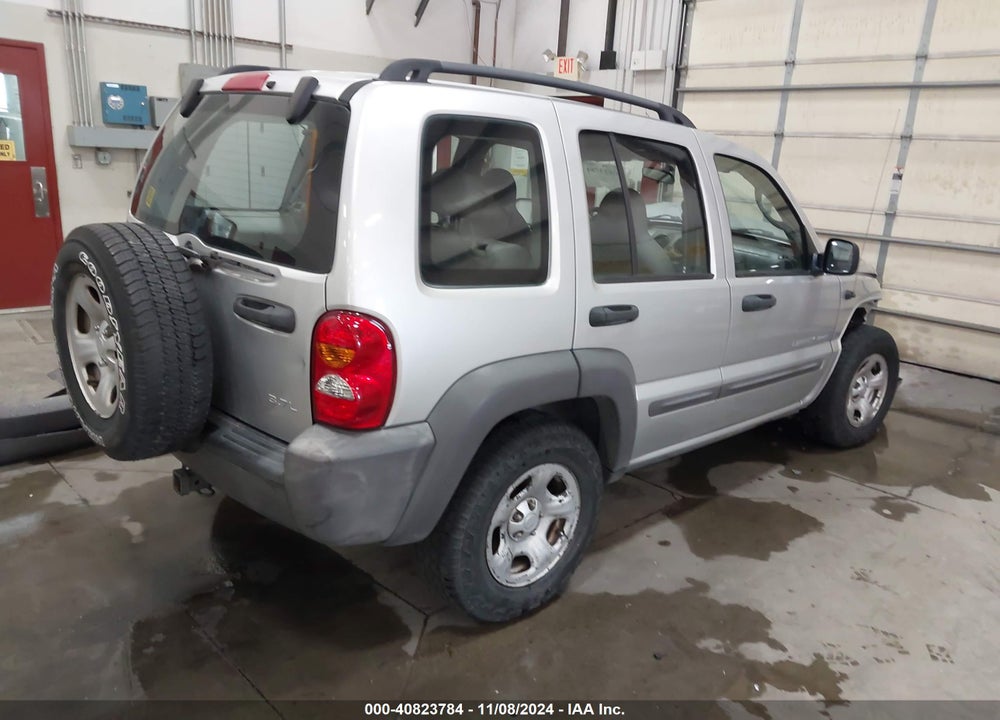 2003 JEEP LIBERTY SPORT VIN: 1J4GL48K73W643329