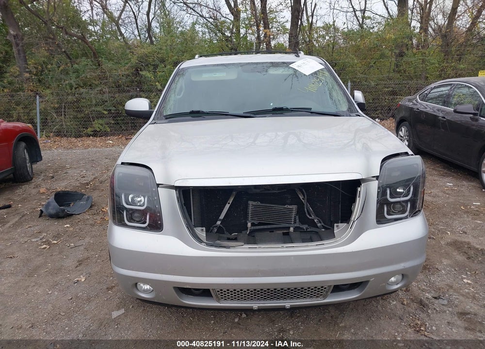 2011 GMC YUKON DENALI VIN: 1GKS1EEF9BR128157