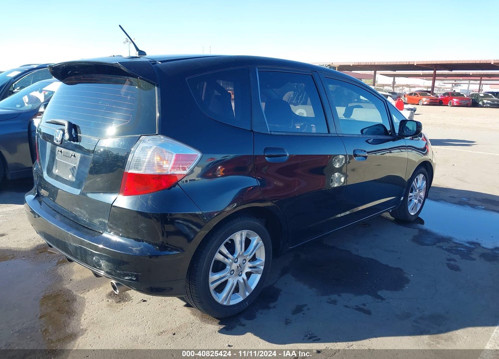 2010 HONDA FIT SPORT VIN: JHMGE8H49AC029307