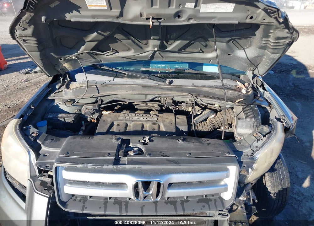 2007 HONDA PILOT EX-L VIN: 5FNYF18777B012604