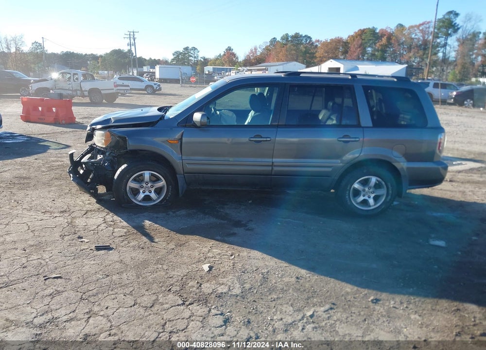 2007 HONDA PILOT EX-L VIN: 5FNYF18777B012604