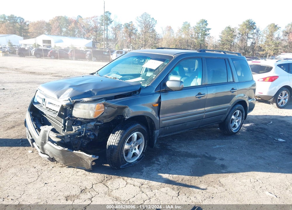 2007 HONDA PILOT EX-L VIN: 5FNYF18777B012604