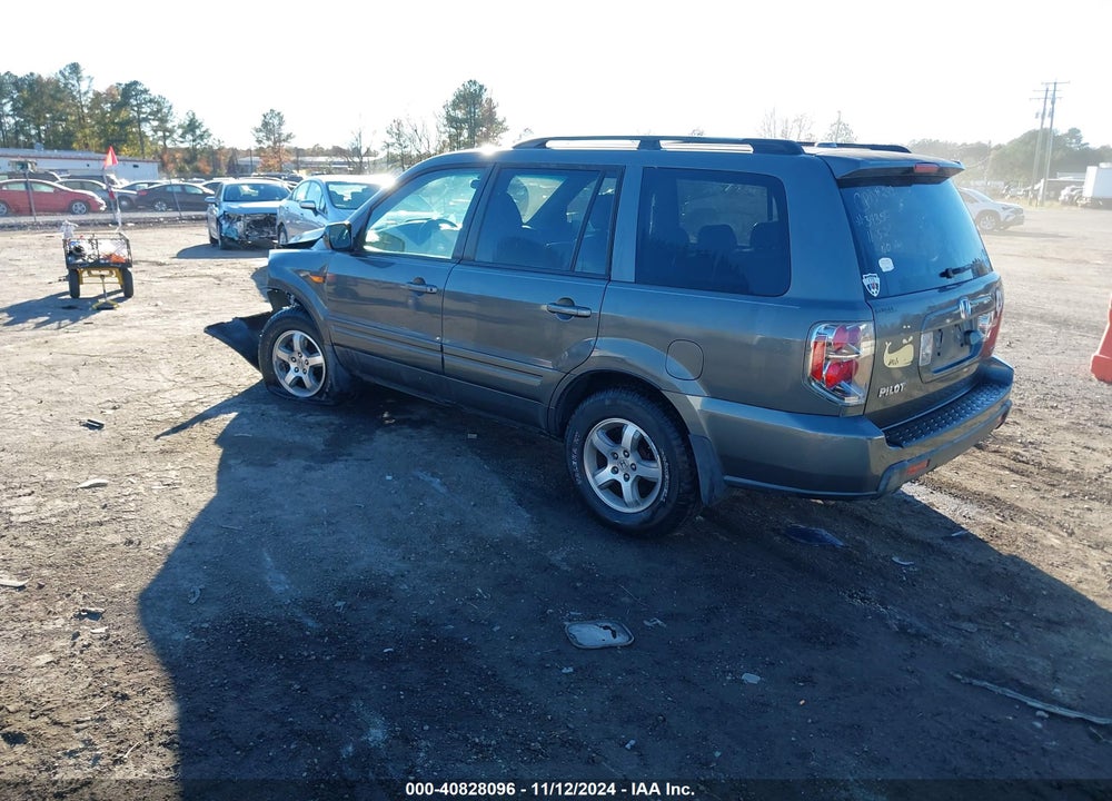 2007 HONDA PILOT EX-L VIN: 5FNYF18777B012604