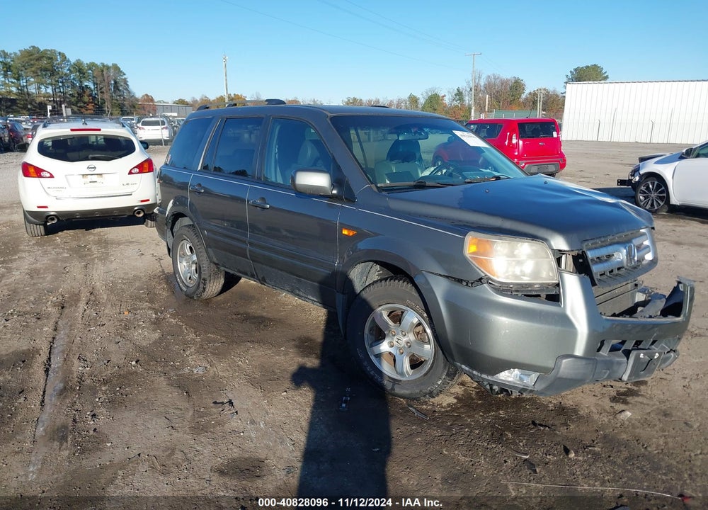 2007 HONDA PILOT EX-L VIN: 5FNYF18777B012604