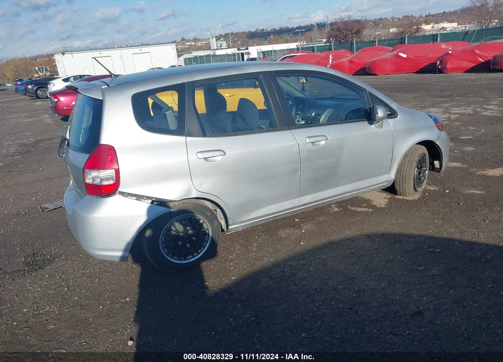 2007 HONDA FIT VIN: JHMGD38457S036100