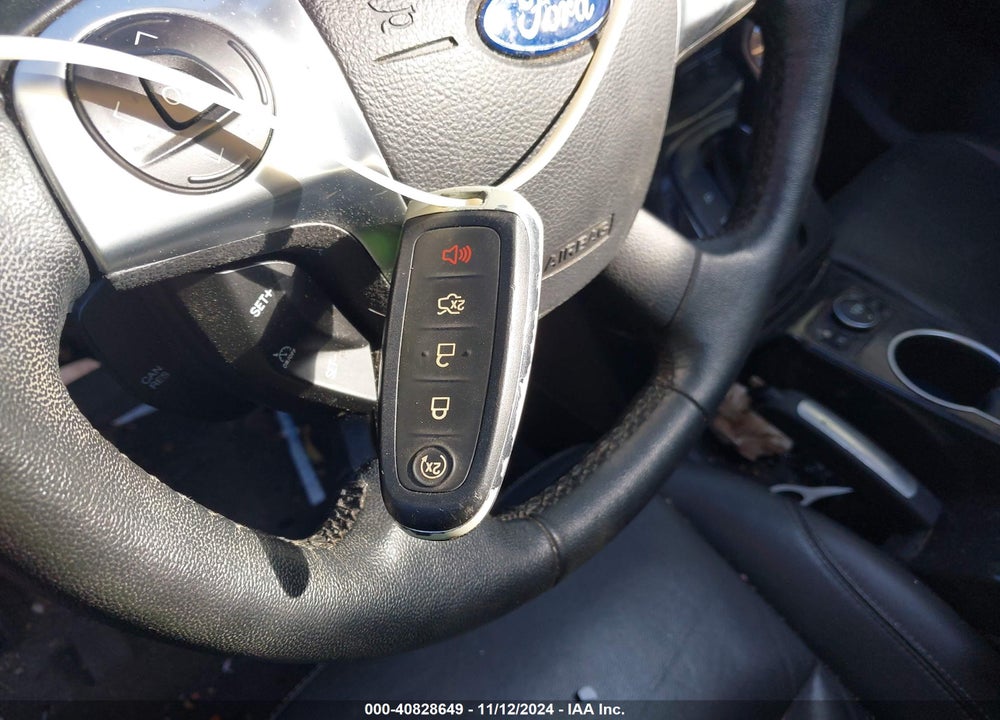 2016 FORD ESCAPE TITANIUM VIN: 1FMCU0JX7GUA97581