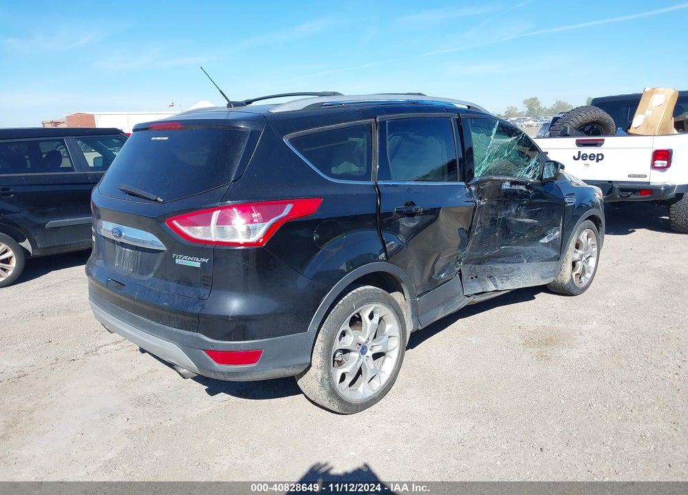 2016 FORD ESCAPE TITANIUM VIN: 1FMCU0JX7GUA97581