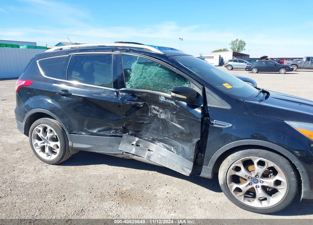 2016 FORD ESCAPE TITANIUM VIN: 1FMCU0JX7GUA97581
