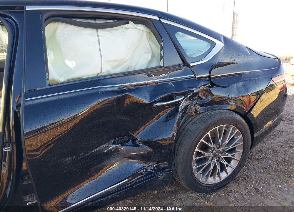 2021 GENESIS G80 VIN: KMTGB4SCXMU046703