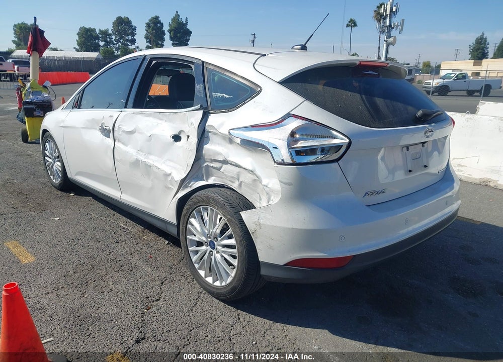 2015 FORD FOCUS TITANIUM VIN: 1FADP3N23FL380229
