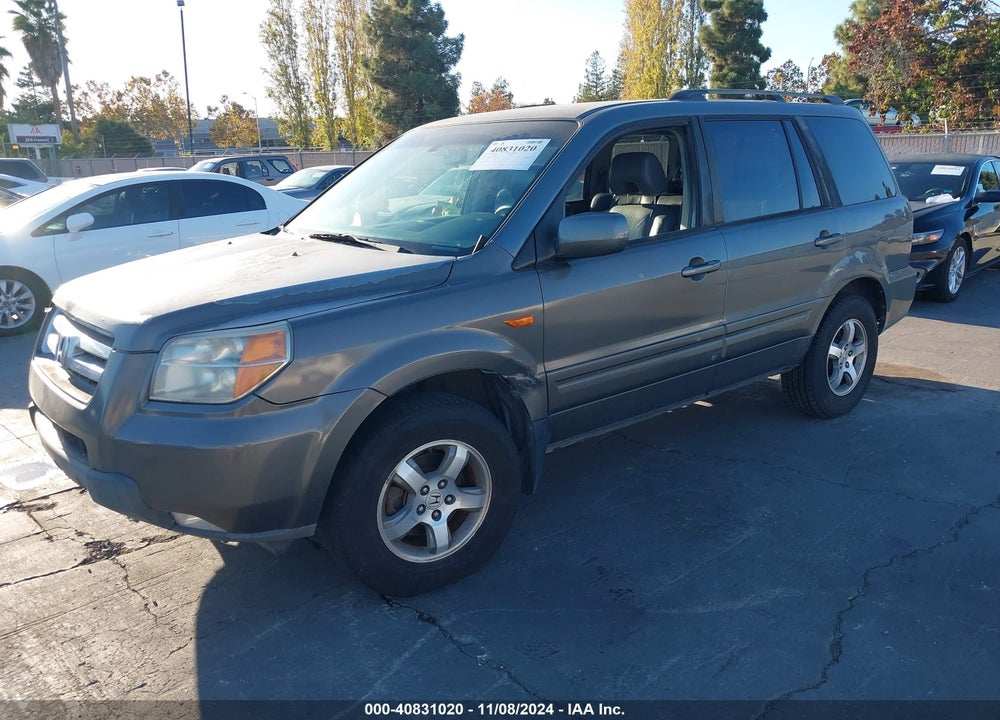 2007 HONDA PILOT EX-L VIN: 5FNYF28697B026811