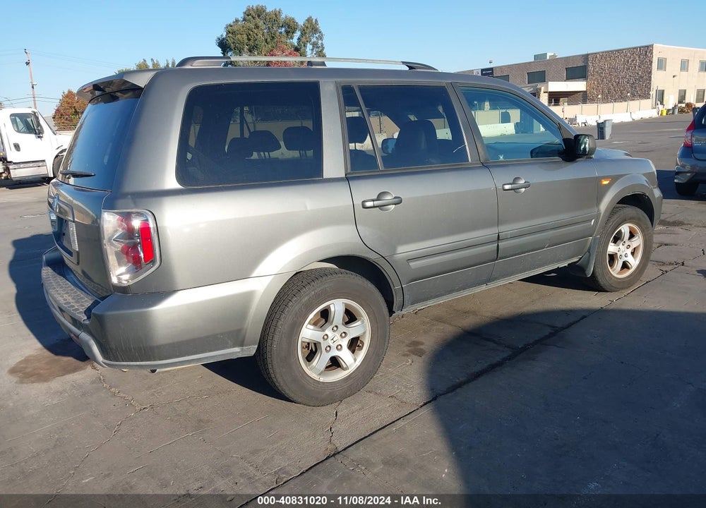 2007 HONDA PILOT EX-L VIN: 5FNYF28697B026811