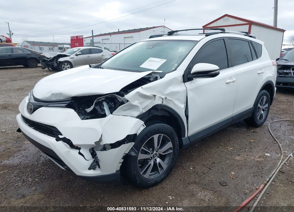 2017 TOYOTA RAV4 XLE VIN: JTMWFREV9HJ112027