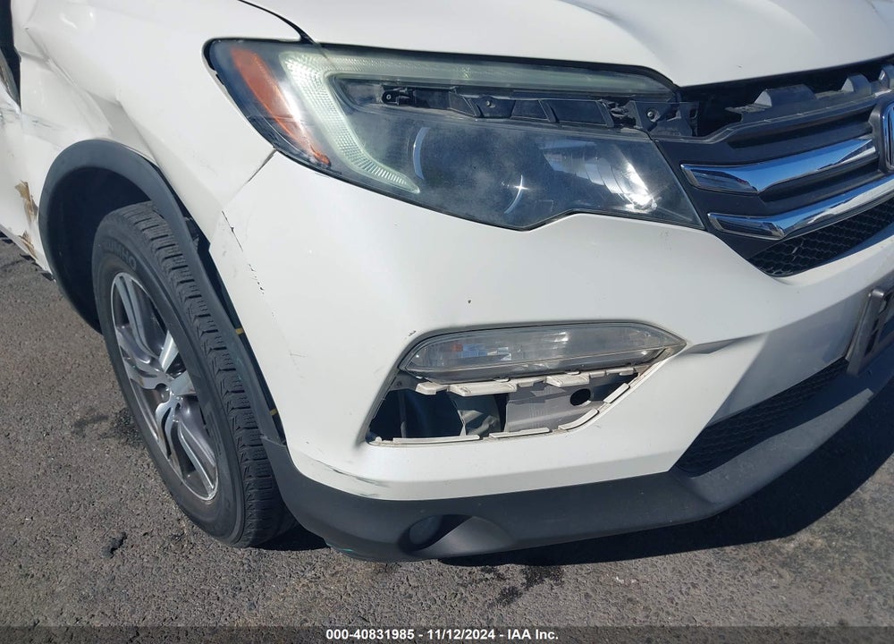 2018 HONDA PILOT EX-L VIN: 5FNYF5H51JB033235