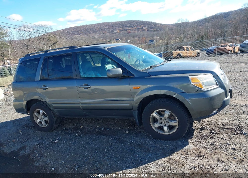 2007 HONDA PILOT EX-L VIN: 5FNYF18697B013499