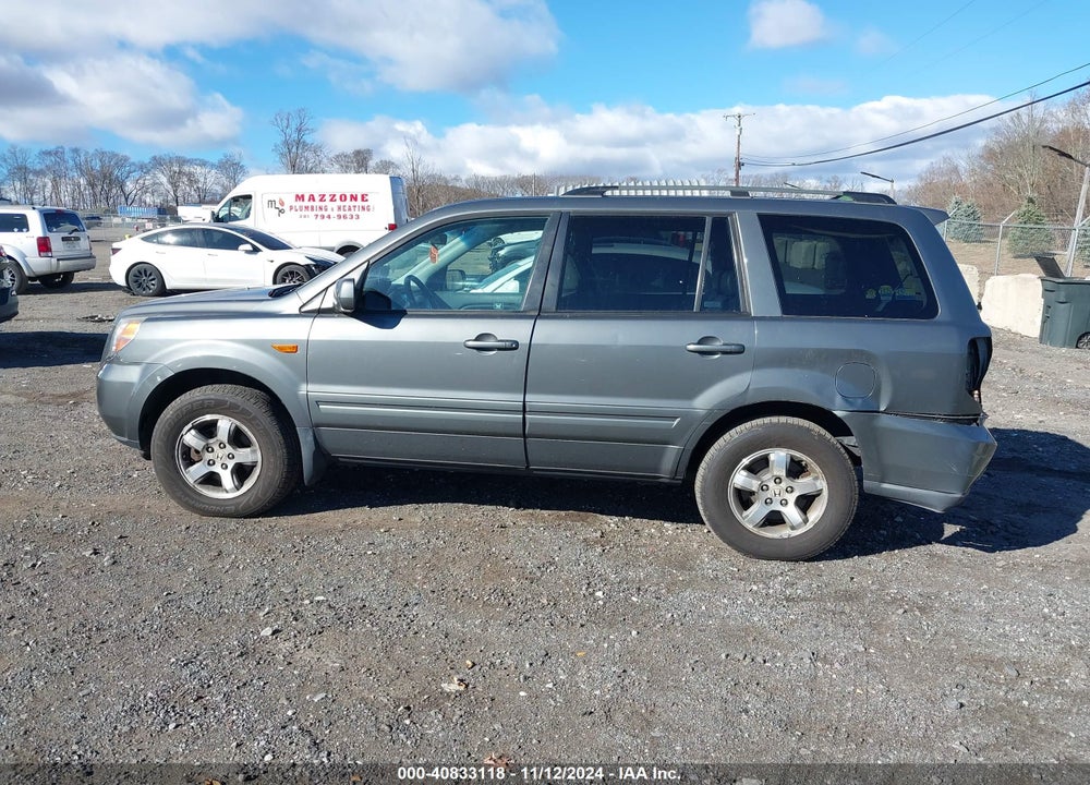 2007 HONDA PILOT EX-L VIN: 5FNYF18697B013499