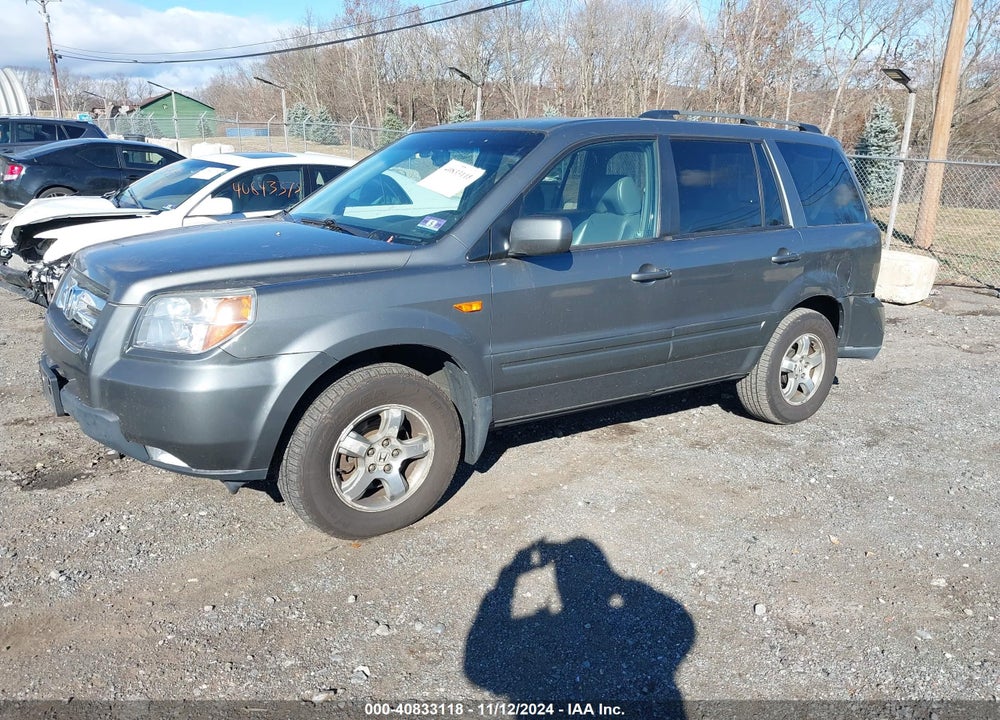 2007 HONDA PILOT EX-L VIN: 5FNYF18697B013499