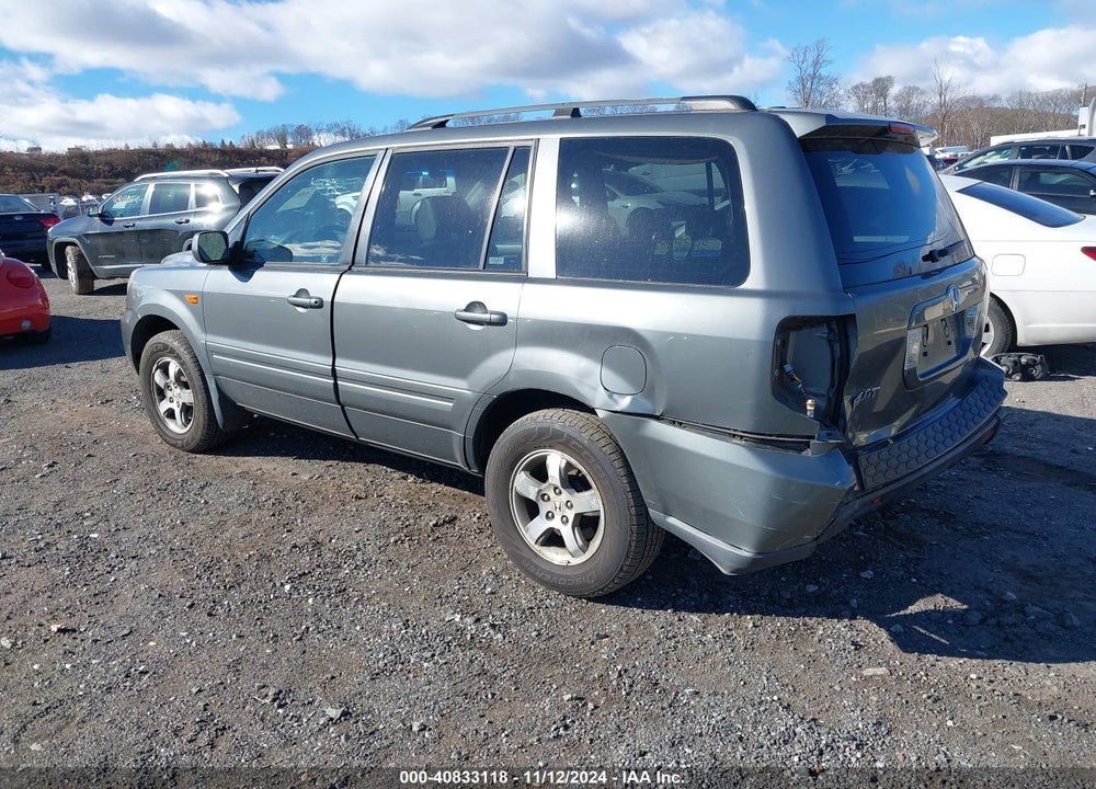 2007 HONDA PILOT EX-L VIN: 5FNYF18697B013499