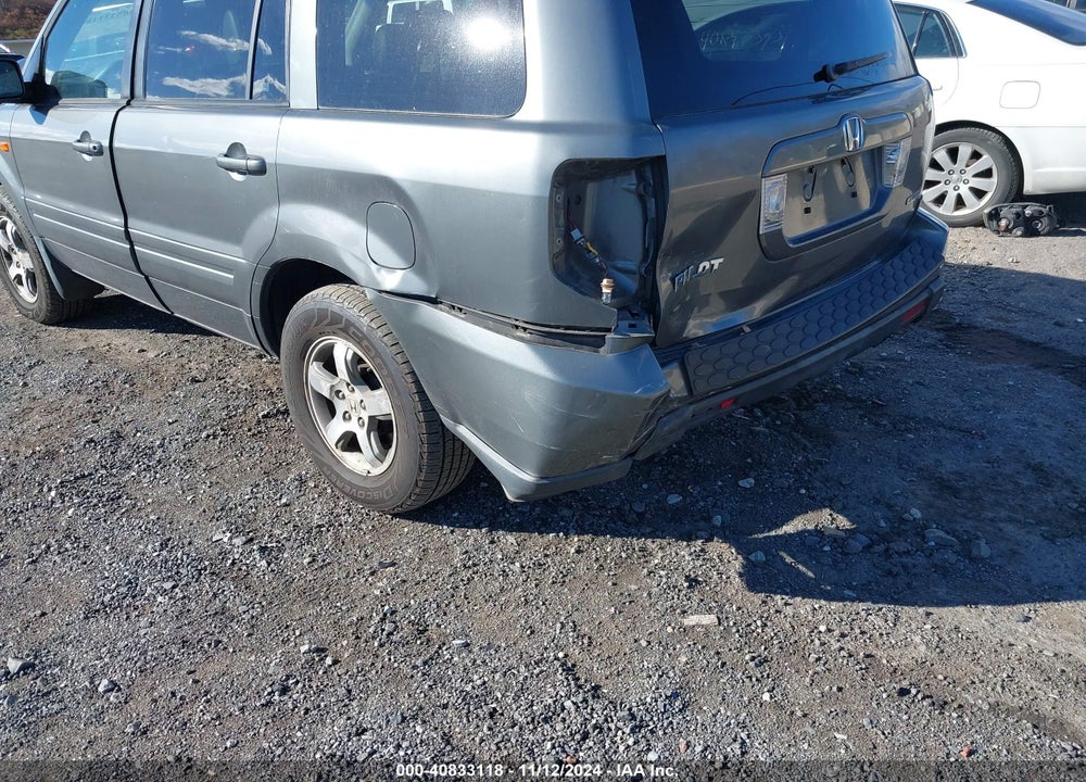2007 HONDA PILOT EX-L VIN: 5FNYF18697B013499