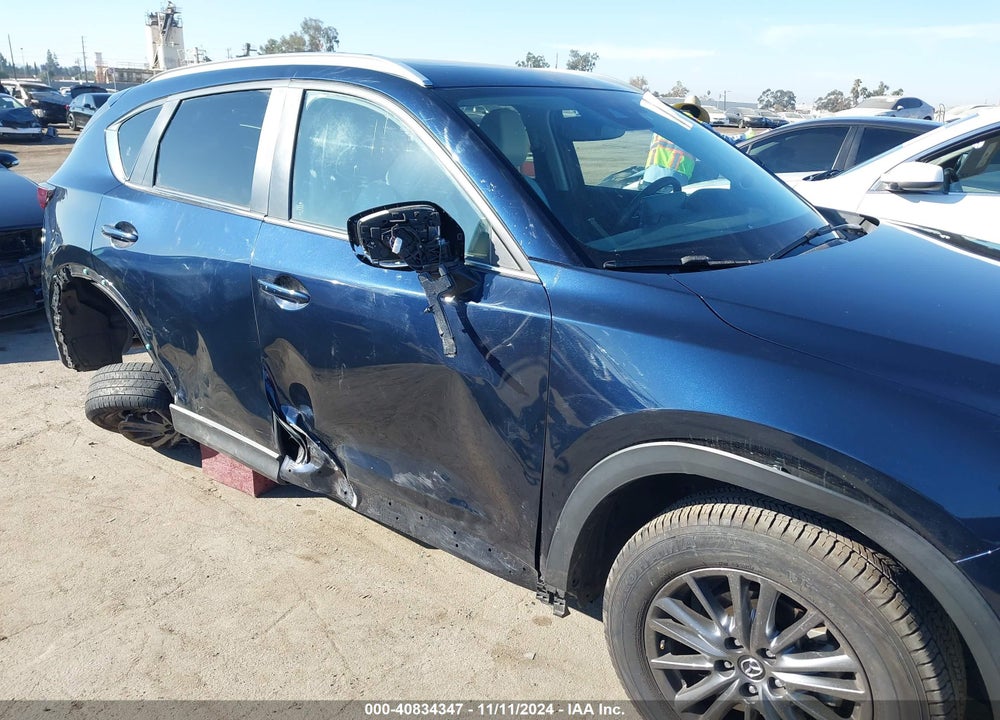 2021 MAZDA CX-5 TOURING VIN: JM3KFACM1M1324786